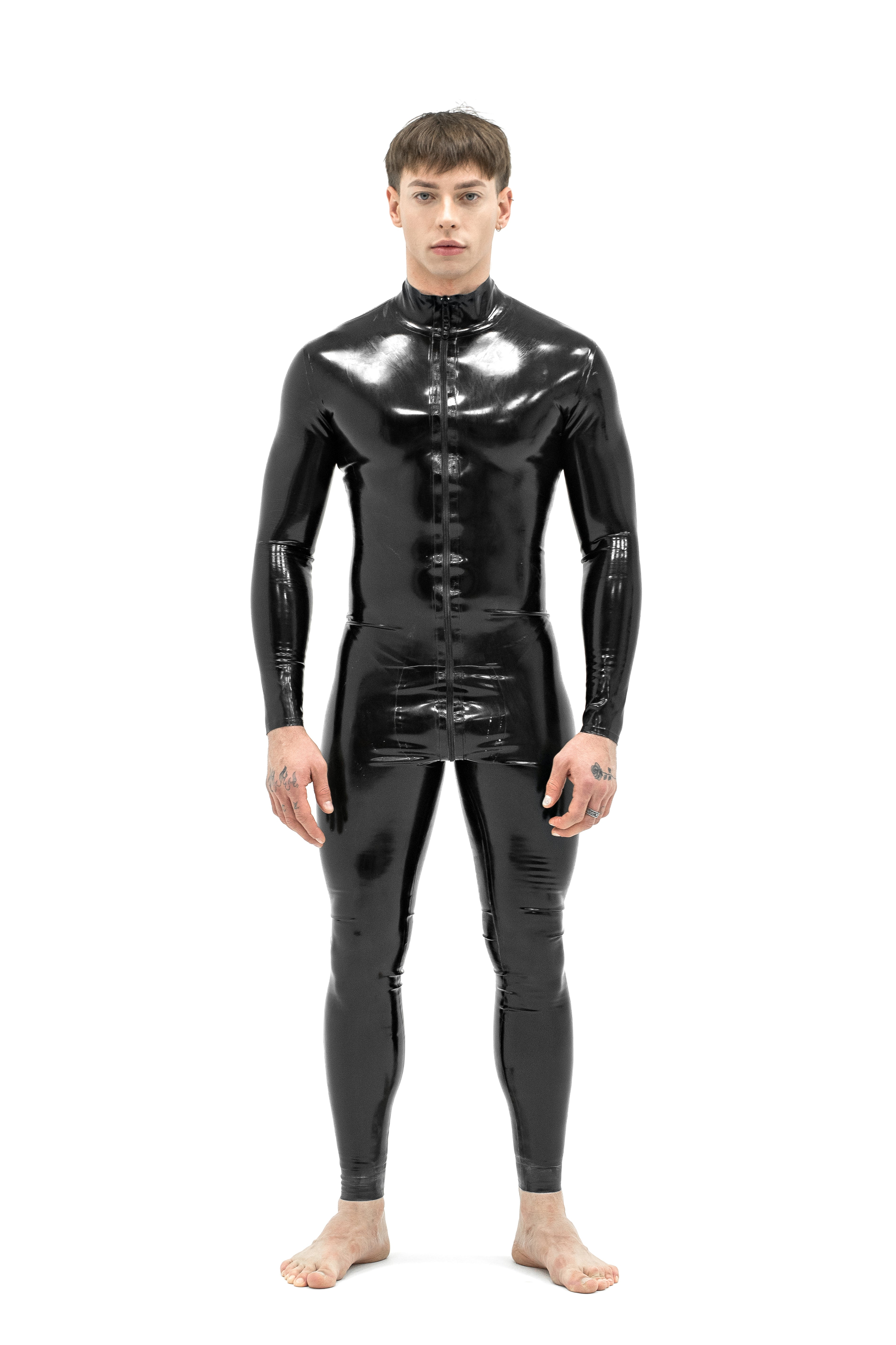 Man in a black latex catsuit, front view