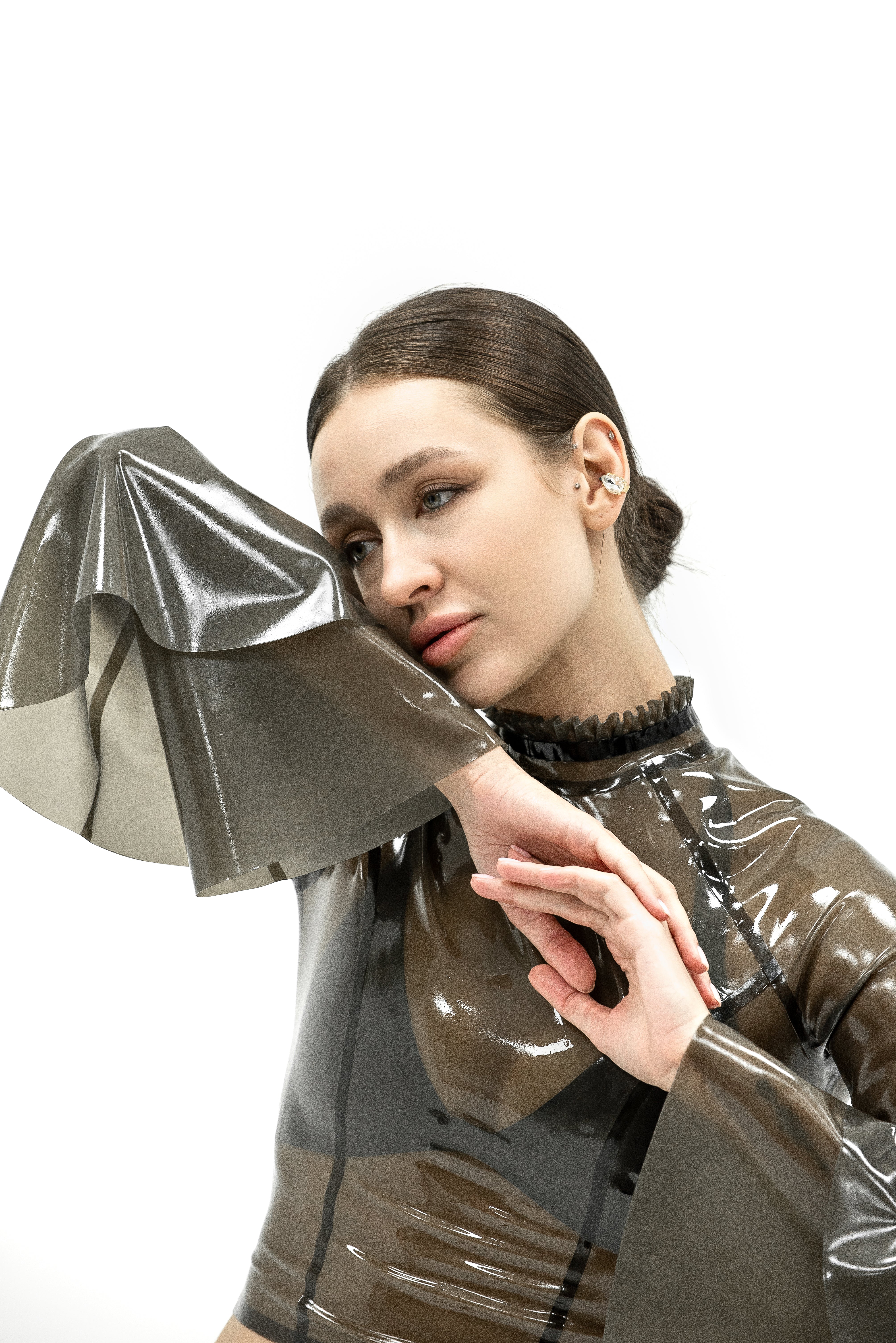 Latex top with ruffled sleeves in semi-transparent black color