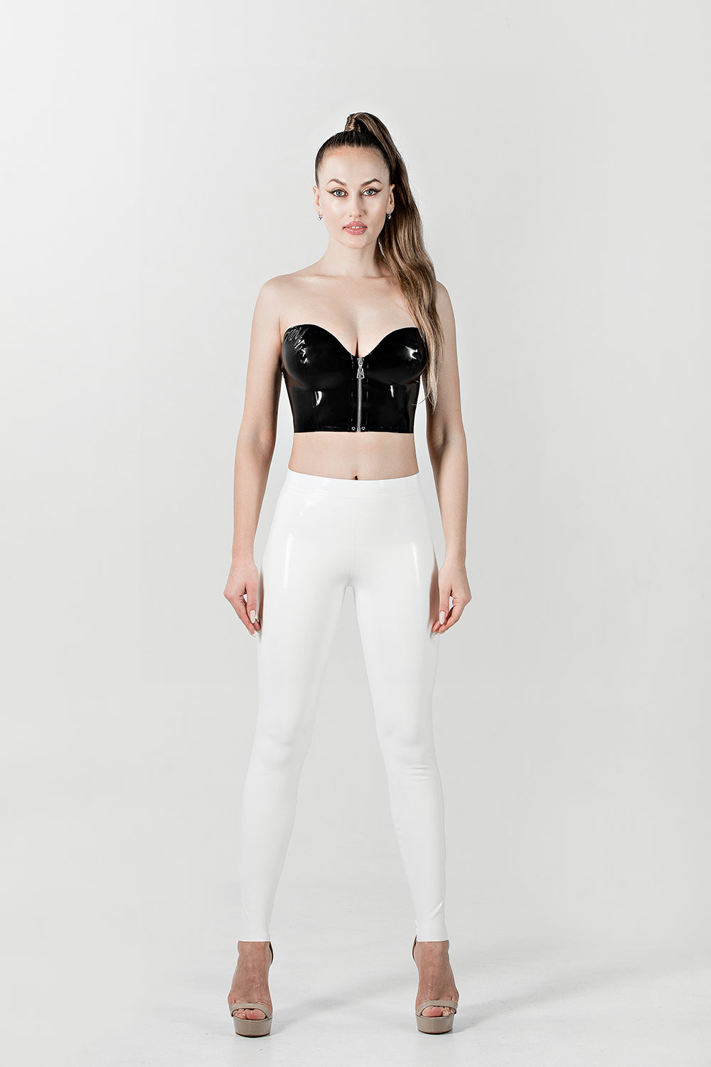 Latex top with front zipper. Black