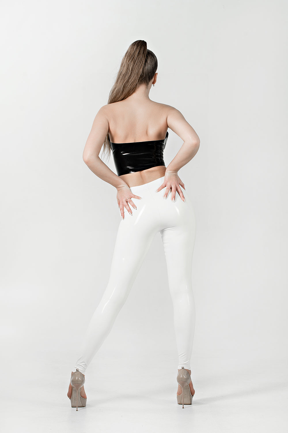 Latex top with front zipper. Black