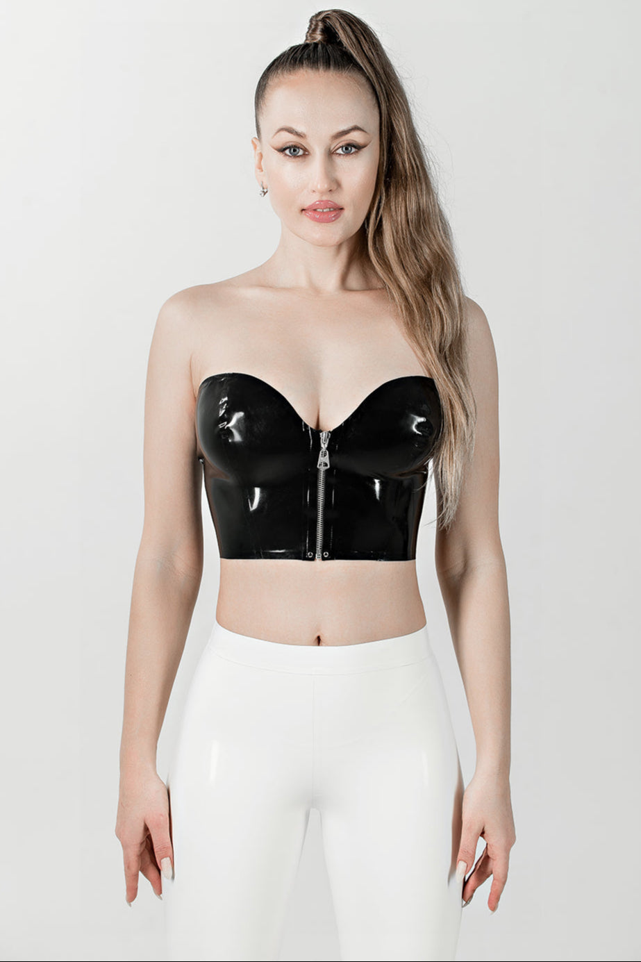 Latex top with front zipper. Black
