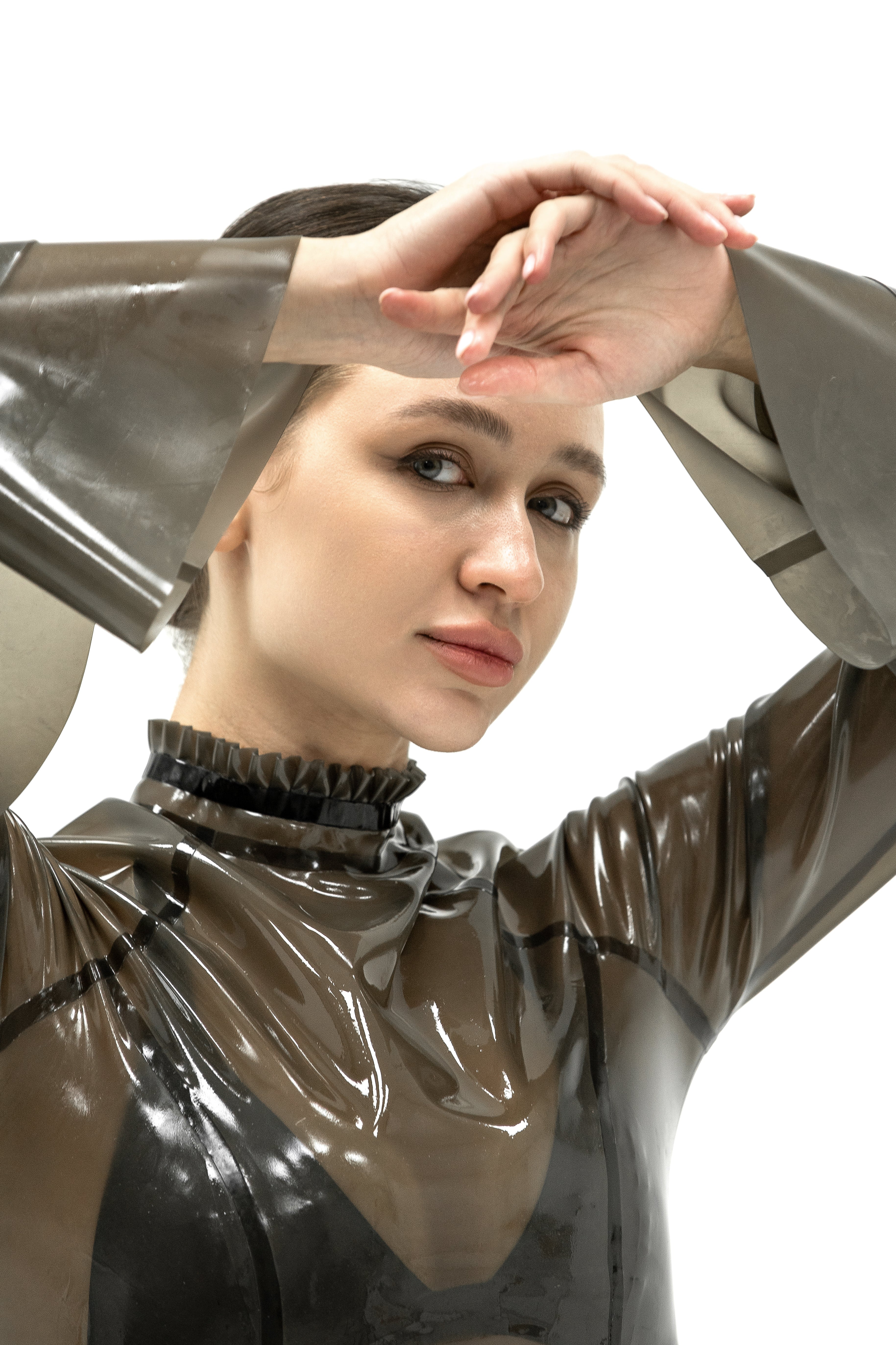 Latex top with ruffled sleeves in semi-transparent black color