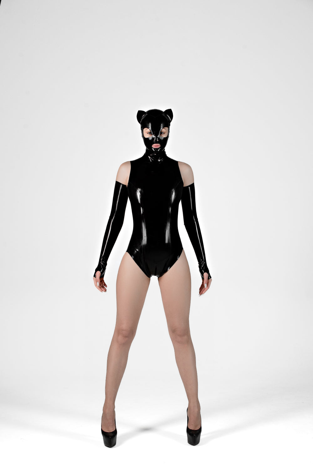 Latex cat mask with opened mouth. Black